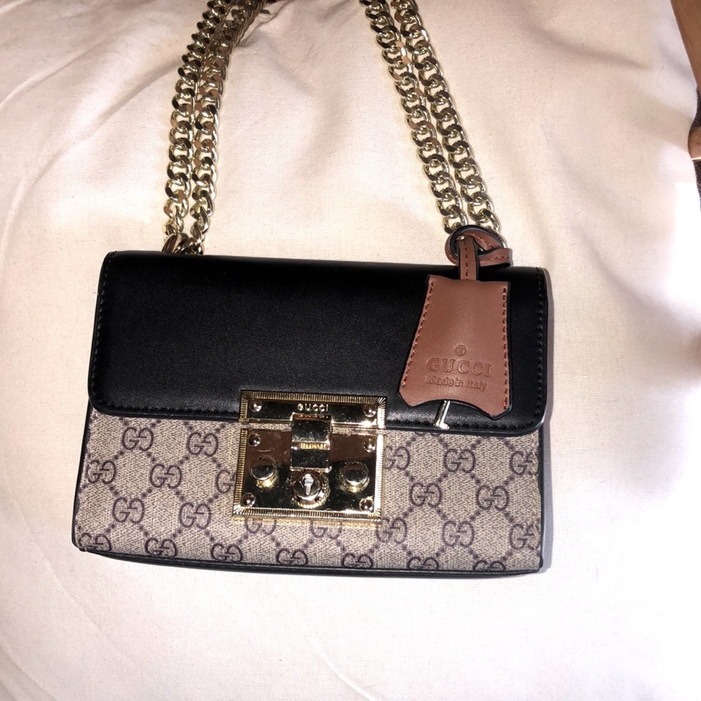 This is an GUCCI PADLOCK MINI SHOULDER BAG